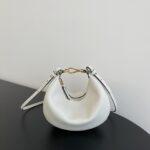 Fendi Praphy Shoulder Bag – Elegant Crescent Silhouette with Signature Gold Logo